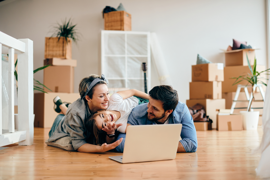 A family using their laptop at home