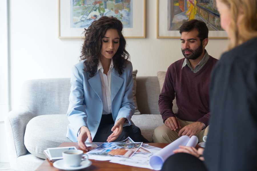 A couple reviewing property information